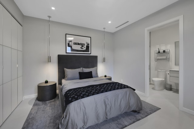 bedroom featuring ensuite bath