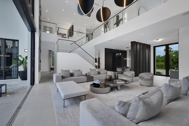 living room with a high ceiling