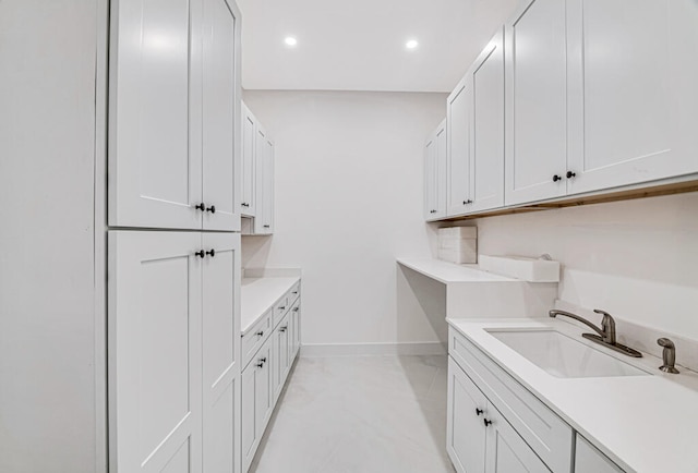 laundry area with sink