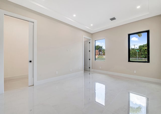 view of tiled spare room