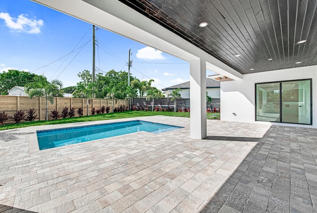 view of pool featuring a patio