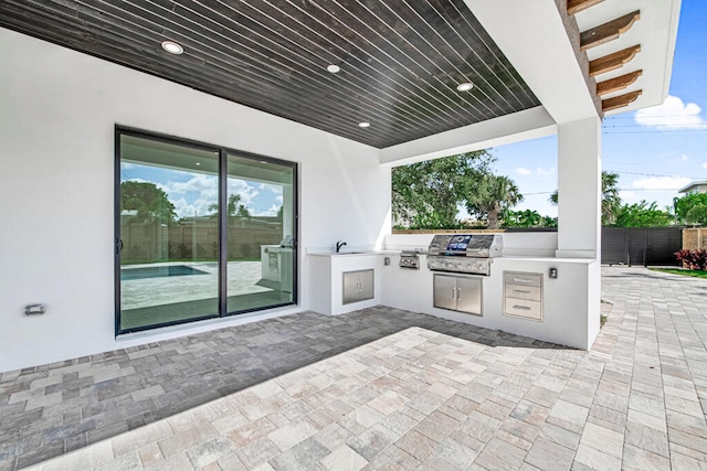 view of patio / terrace with grilling area and exterior kitchen