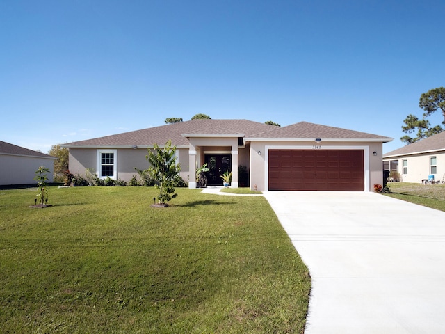 ranch-style house with a front yard and a garage