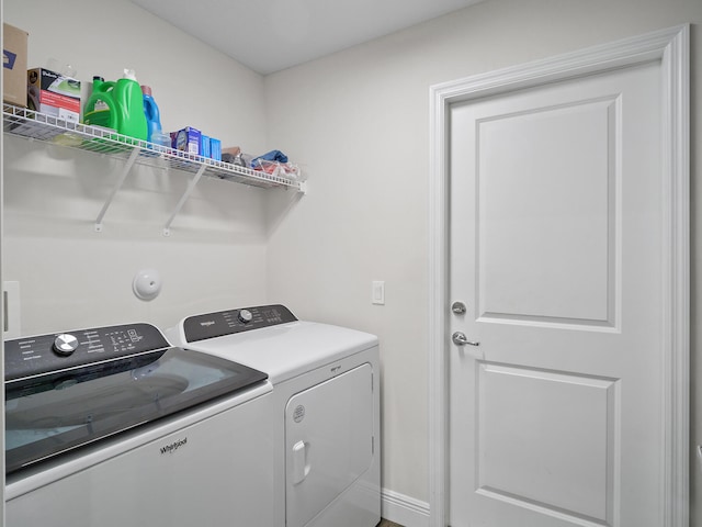 washroom featuring washer and dryer