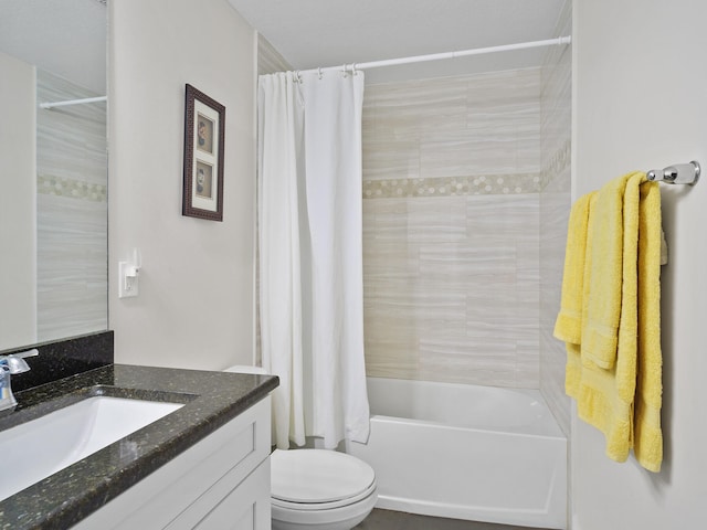 full bathroom featuring vanity, toilet, and shower / tub combo with curtain