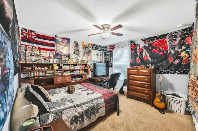 carpeted bedroom with a textured ceiling and ceiling fan