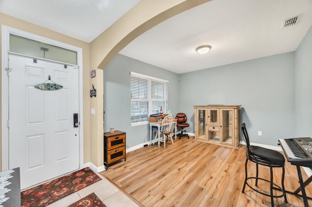 foyer featuring hardwood / wood-style floors