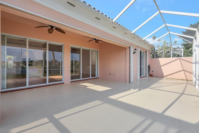 view of patio / terrace featuring glass enclosure