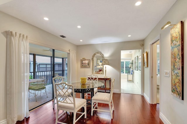 dining room featuring dark wood-type flooring