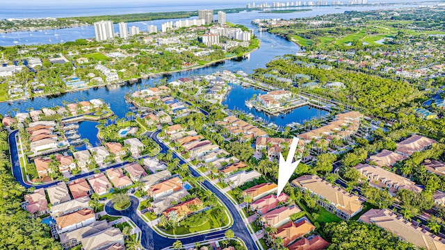 birds eye view of property featuring a water view