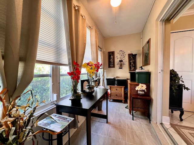 dining space with light tile patterned floors