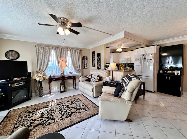 tiled living room featuring a textured ceiling, ceiling fan, and crown molding