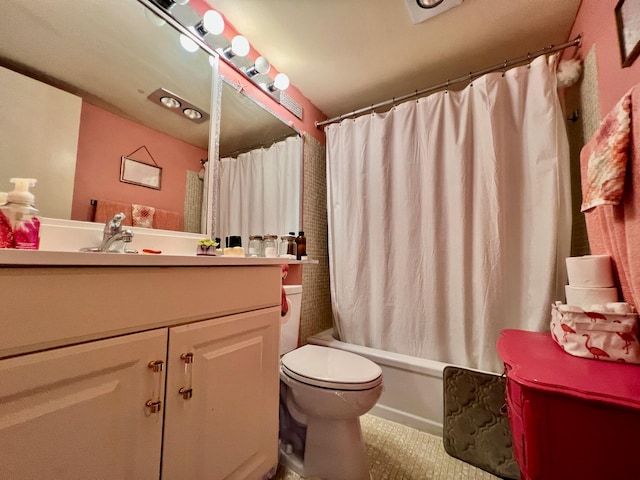 full bathroom featuring vanity, toilet, and shower / bath combo with shower curtain