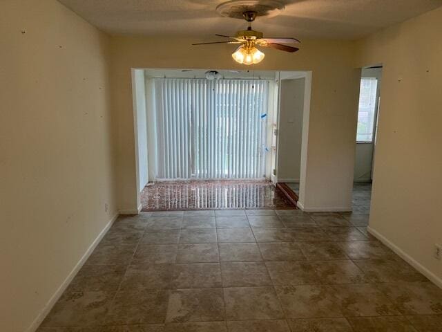 empty room with ceiling fan