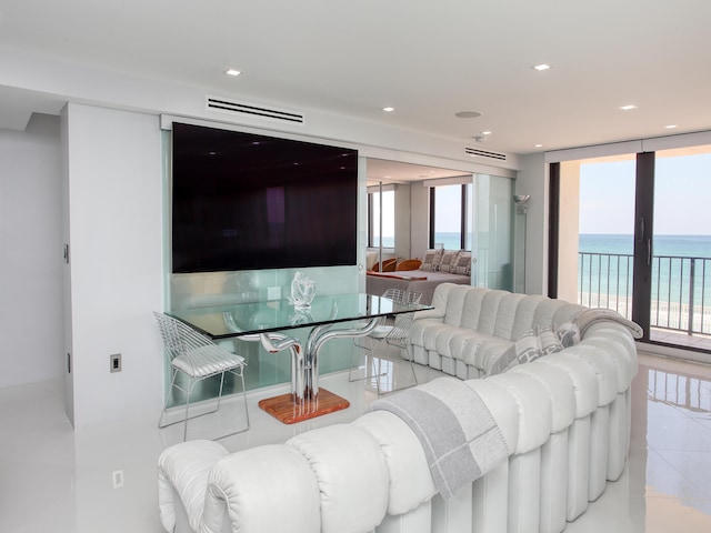 living room featuring light tile patterned flooring