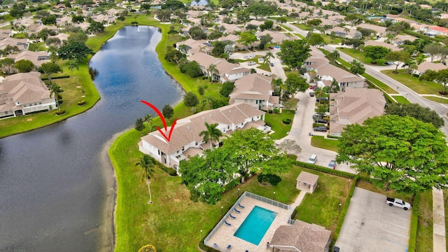 drone / aerial view with a water view