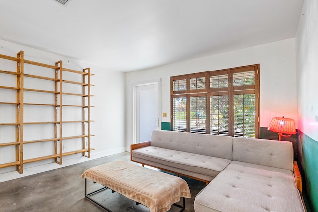 living room with concrete floors