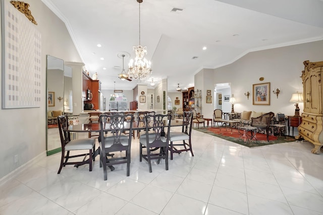 tiled dining space featuring an inviting chandelier and crown molding