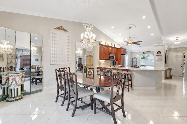 dining area with ceiling fan with notable chandelier, ornamental molding, and light tile patterned flooring