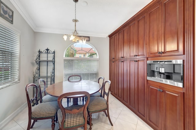 dining room with ornamental molding, light tile patterned floors, and a notable chandelier