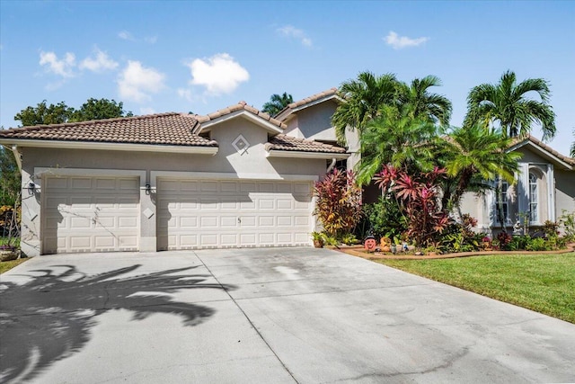 mediterranean / spanish-style house featuring a garage