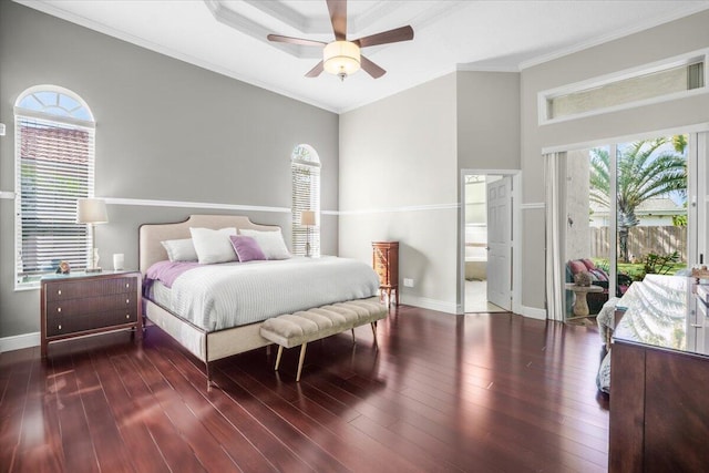 bedroom with ensuite bath, access to outside, ceiling fan, crown molding, and dark wood-type flooring