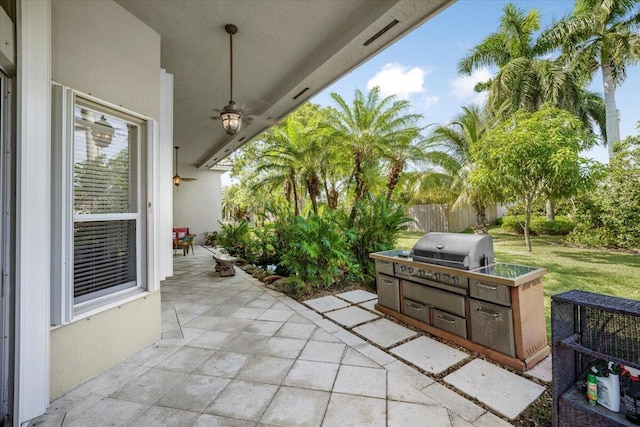 view of patio with area for grilling and grilling area