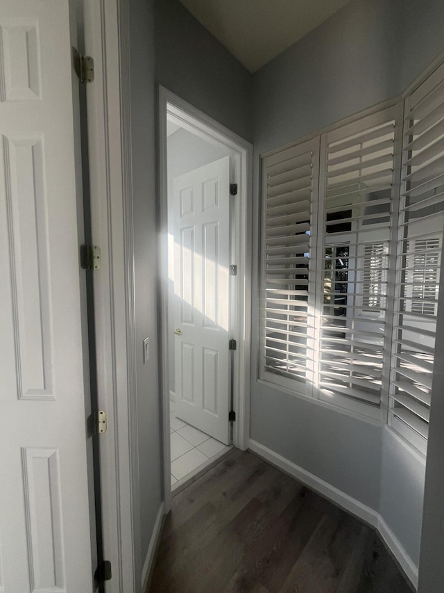 doorway to outside featuring dark hardwood / wood-style flooring