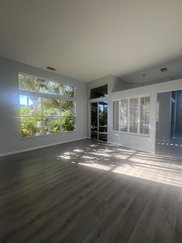 unfurnished living room with hardwood / wood-style floors