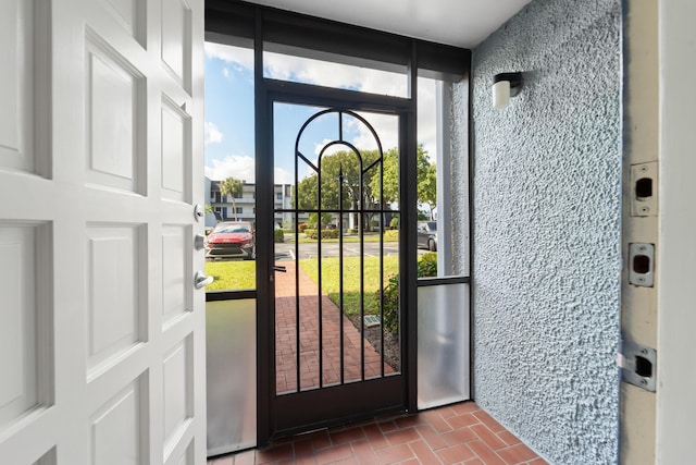 entryway featuring a wall of windows