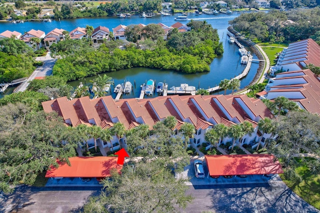 birds eye view of property featuring a water view