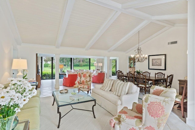 tiled living room featuring lofted ceiling with beams and a notable chandelier