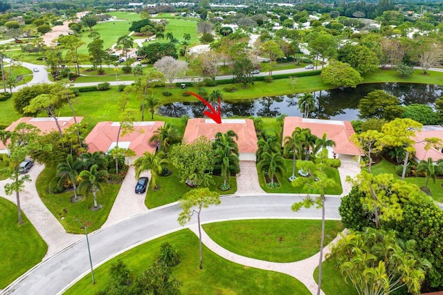 drone / aerial view with a water view