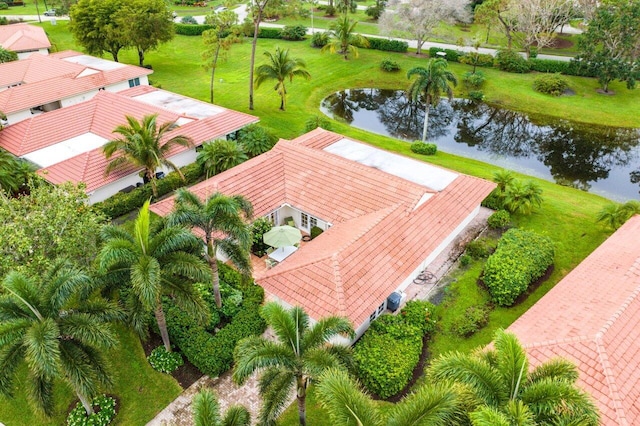 drone / aerial view with a water view