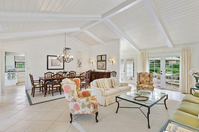 tiled living room featuring lofted ceiling with beams, a chandelier, and french doors