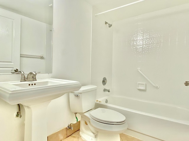 bathroom featuring tile patterned floors, shower / bath combination, and toilet