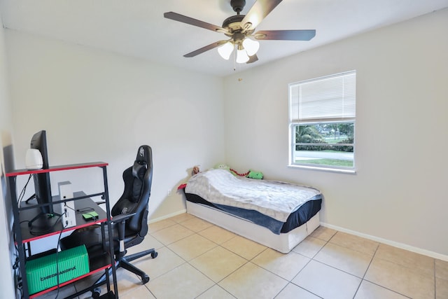 bedroom featuring ceiling fan and light tile patterned floors