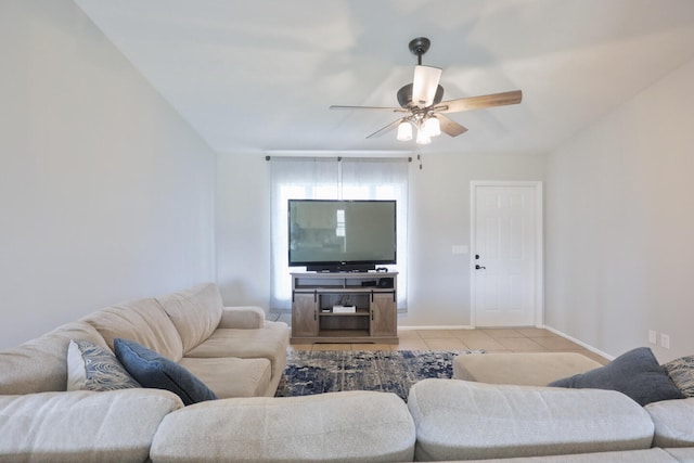 tiled living room featuring ceiling fan