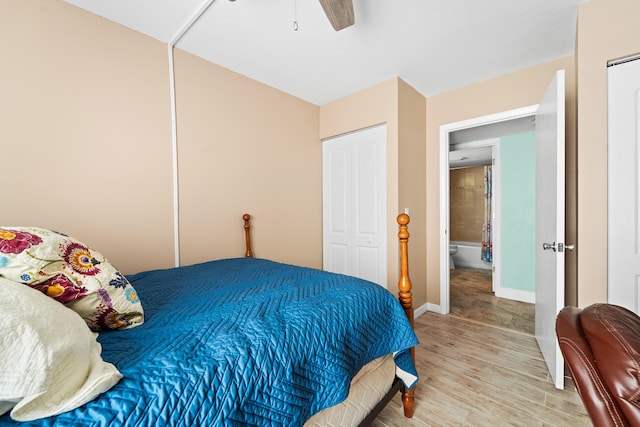 bedroom featuring light wood-type flooring, baseboards, a closet, and a ceiling fan