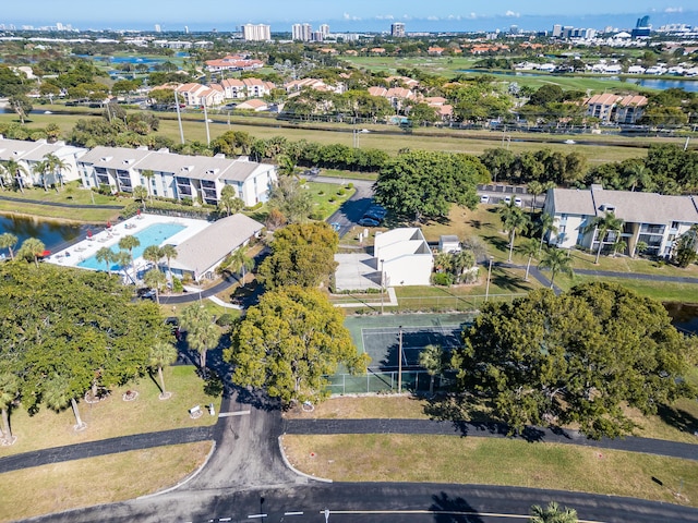 bird's eye view with a water view and a residential view