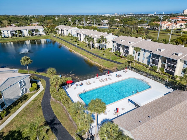 bird's eye view featuring a residential view and a water view