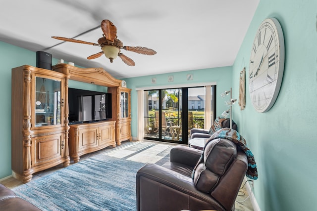 living room with ceiling fan