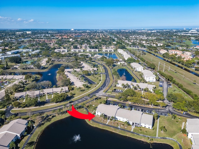 bird's eye view with a water view and a residential view