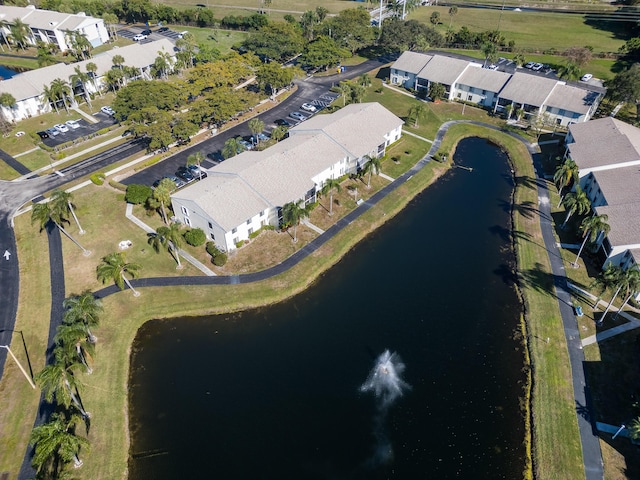 aerial view with a residential view and a water view