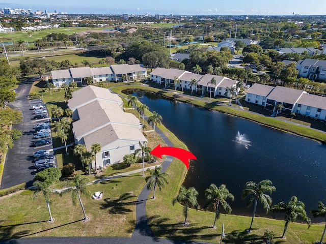 bird's eye view featuring a residential view and a water view