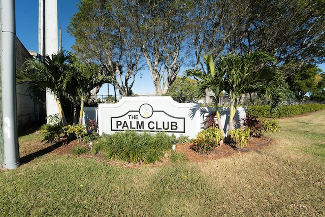 community sign with a yard