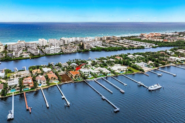 birds eye view of property featuring a water view