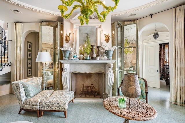 813 N Atlantic Dr, Lantana, FL 33462 - living area with arched walkways, speckle patterned floor, and baseboards