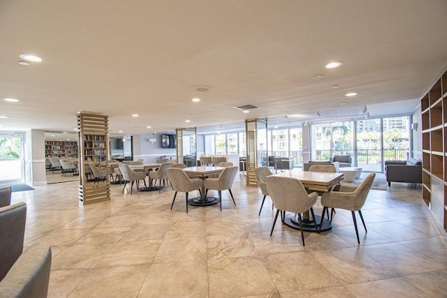 dining room with a wall of windows