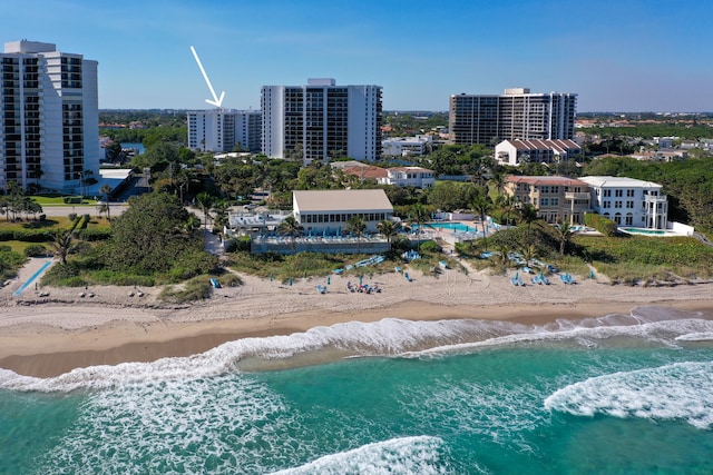 drone / aerial view with a view of the beach and a water view